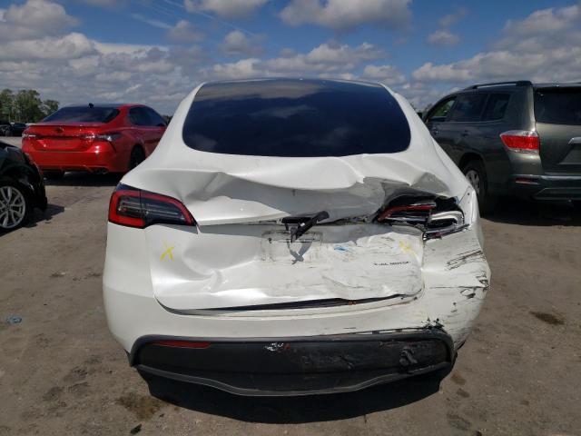 Photo 9 from auction – 2021 TESLA MODEL Y with VIN 5YJYGDEE6MF077747