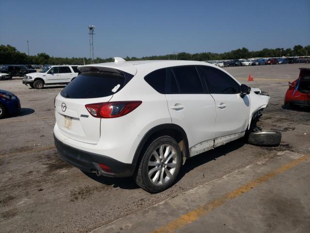 Photo 4 from auction – 2013 MAZDA CX-5 GT with VIN JM3KE2DE8D0104292