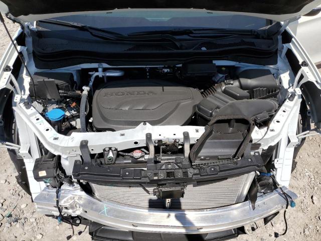 Photo 7 from auction – 2022 HONDA PASSPORT E with VIN 5FNYF7H56NB004928