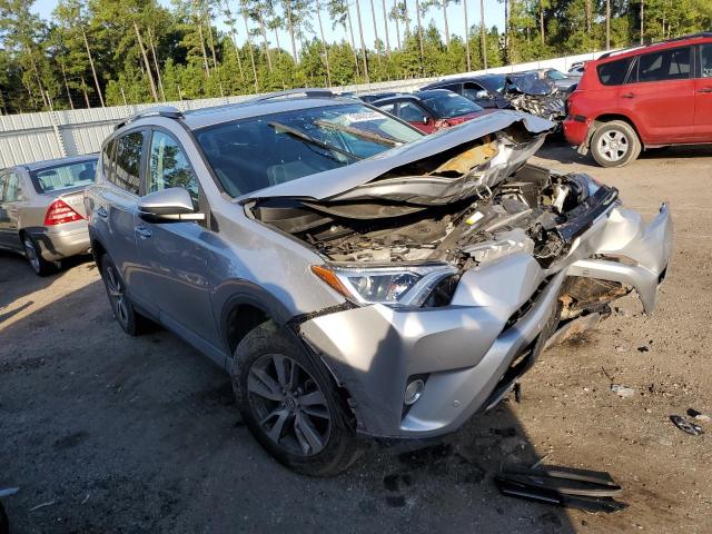 TOYOTA RAV4 XLE 2017 with VIN 2T3WFREV8HW390791 - Photo from auction