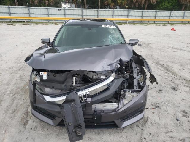 Photo 9 from auction – 2016 HONDA CIVIC EX with VIN 19XFC2F75GE074730