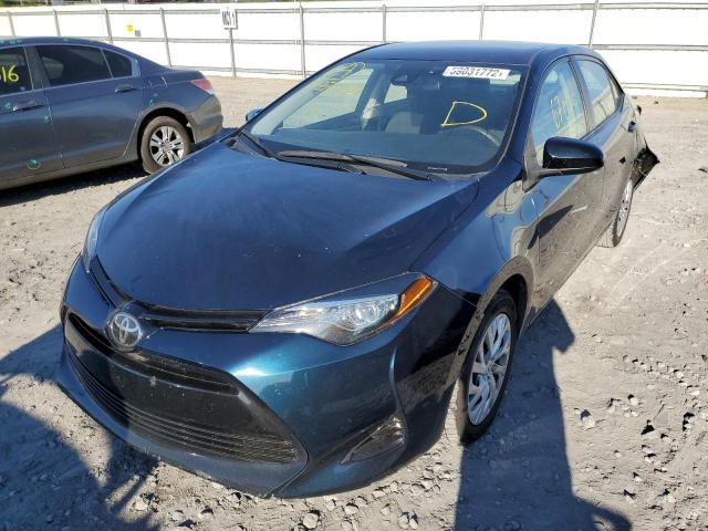 Photo 2 from auction – 2018 TOYOTA COROLLA L with VIN 5YFBURHE9JP847074