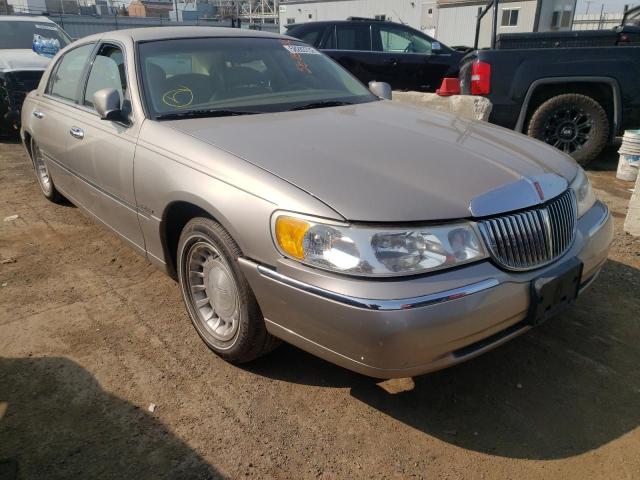 LINCOLN TOWN CAR E 2000 with VIN 1LNHM81W1YY888419 - Photo from auction