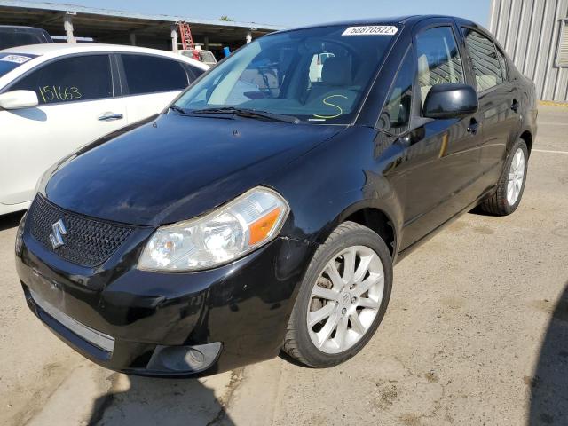 Zdjęcie 2 z aukcji – 2011 SUZUKI SX4 LE z VIN JS2YC5A26B6302423