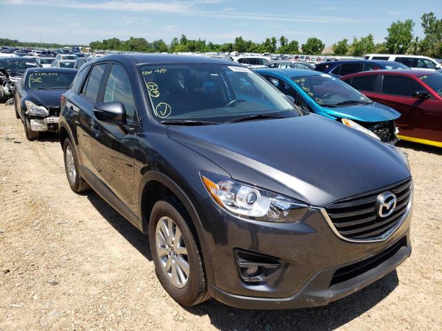 MAZDA CX-5 TOURI 2016 with VIN JM3KE2CY4G0912865 - Photo from auction