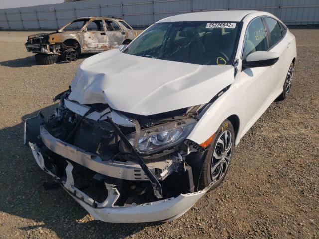 Photo 2 from auction – 2018 HONDA CIVIC LX with VIN 2HGFC2F59JH557939