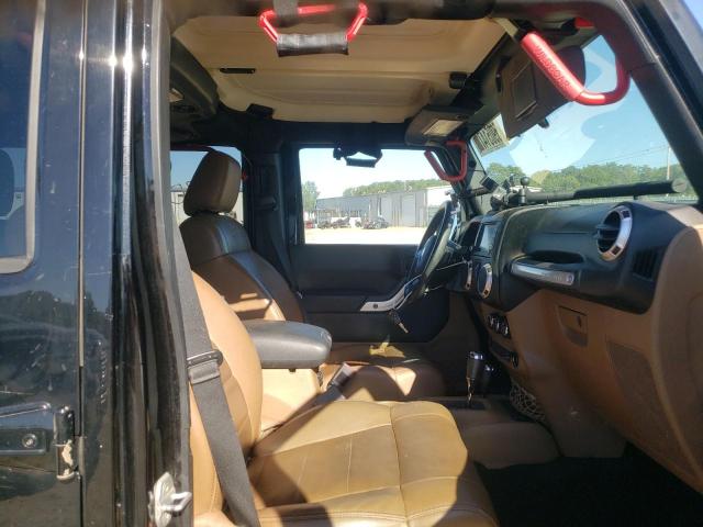 Photo 5 from auction – 2011 JEEP WRANGLER U with VIN 1J4BA6H17BL536624