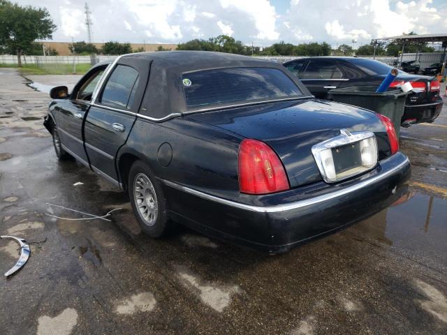 Photo 3 from auction – 2002 LINCOLN TOWN CAR C with VIN 1LNHM83W12Y640272