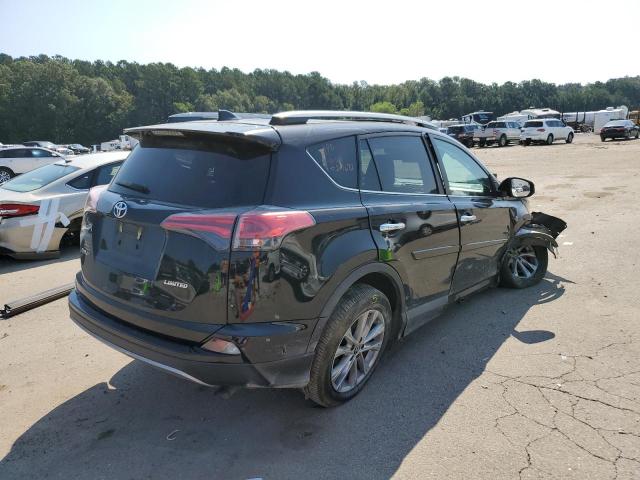 Photo 4 from auction – 2018 TOYOTA RAV4 LIMIT with VIN 2T3YFREV0JW406755