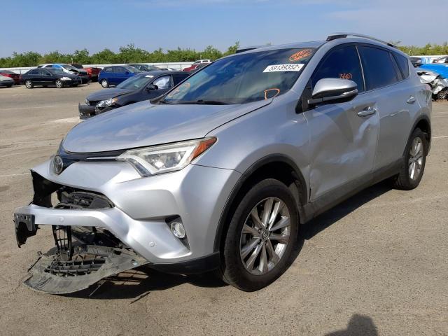 Photo 2 from auction – 2016 TOYOTA RAV4 LIMIT with VIN 2T3YFREV1GW273433