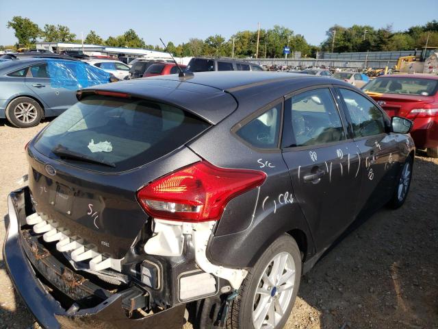 Photo 4 from auction – 2018 FORD FOCUS SE with VIN 1FADP3K2XJL326312