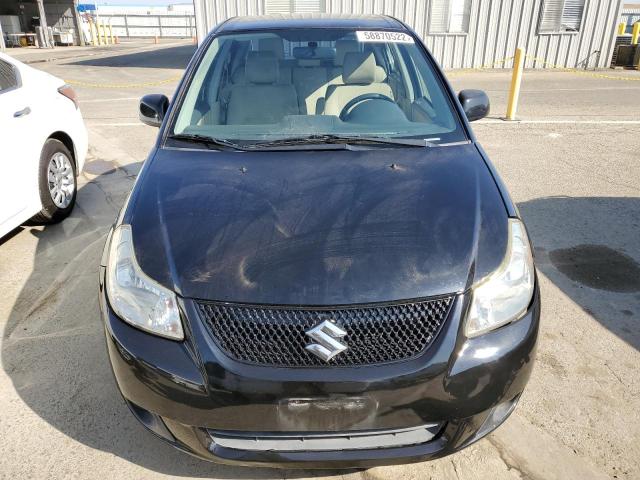 Photo 9 from auction – 2011 SUZUKI SX4 LE with VIN JS2YC5A26B6302423
