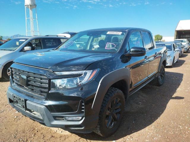 Photo 2 from auction – 2021 HONDA RIDGELINE with VIN 5FPYK3F12MB001390