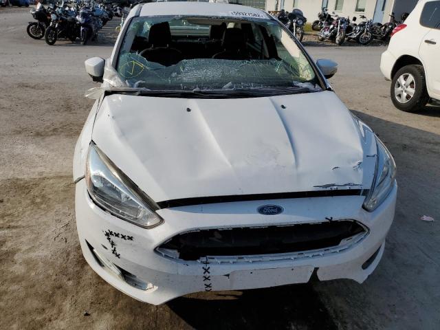 Photo 9 from auction – 2015 FORD FOCUS SE with VIN 1FADP3F29FL327095