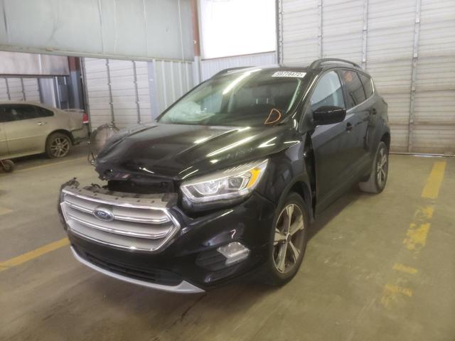Photo 2 from auction – 2017 FORD ESCAPE SE with VIN 1FMCU9G93HUD15899