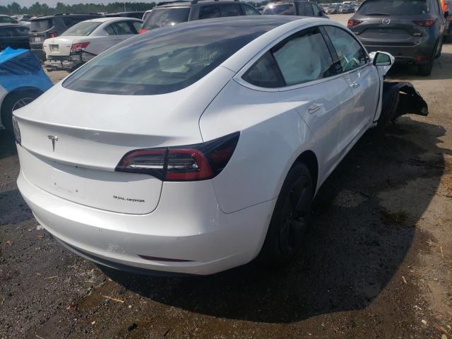 Photo 4 from auction – 2018 TESLA MODEL 3 with VIN 5YJ3E1EB9JF067021
