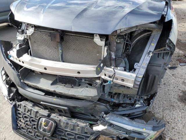 Photo 9 from auction – 2021 HONDA PASSPORT E with VIN 5FNYF8H57MB005221
