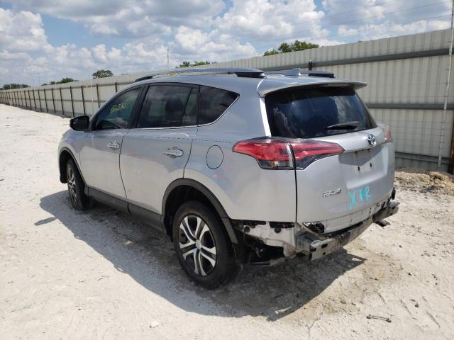 Photo 3 from auction – 2018 TOYOTA RAV4 LE with VIN 2T3ZFREV7JW511572