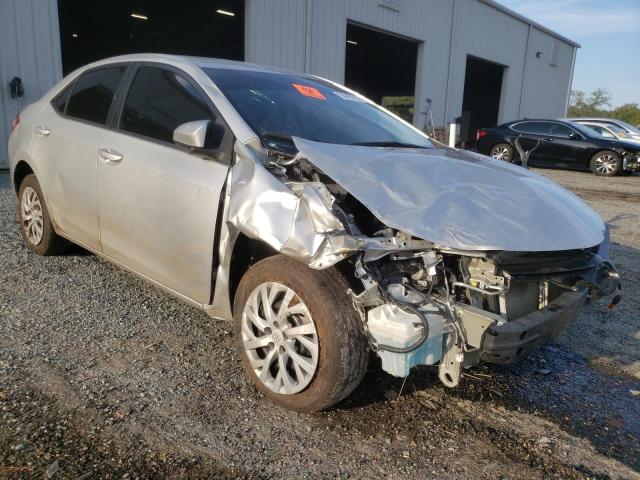 TOYOTA COROLLA L 2019 with VIN 5YFBURHE2KP875459 - Photo from auction