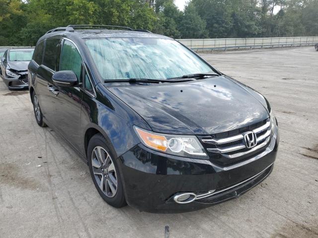 HONDA ODYSSEY TO 2014 with VIN 5FNRL5H97EB094384 - Photo from auction