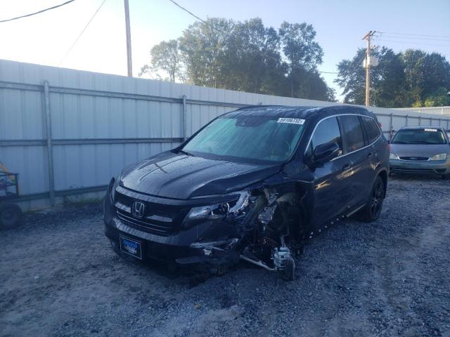 Photo 2 from auction – 2022 HONDA PILOT SE with VIN 5FNYF5H21NB025602