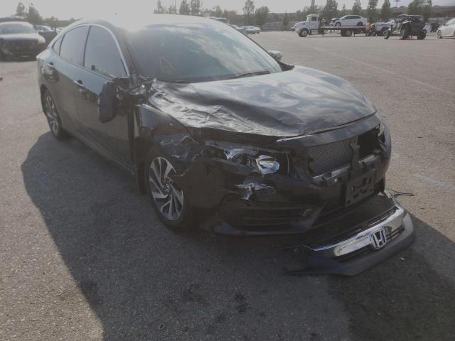 HONDA CIVIC EX 2018 with VIN 2HGFC2F70JH607841 - Photo from auction
