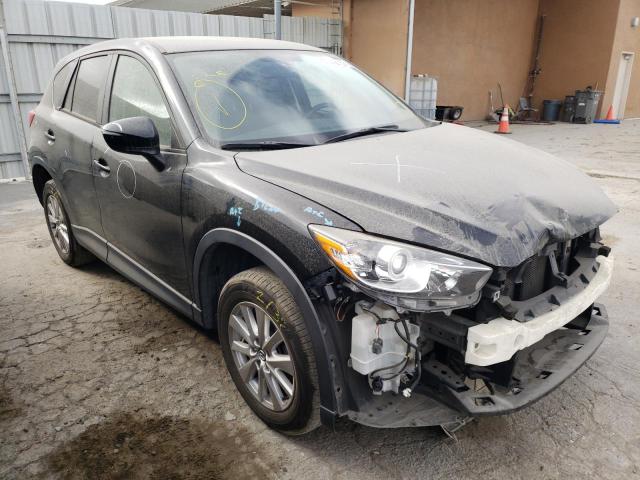 MAZDA CX-5 TOURI 2016 with VIN JM3KE2CYXG0884540 - Photo from auction