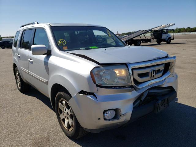 HONDA PILOT TOUR 2010 with VIN 5FNYF4H92AB002122 - Photo from auction