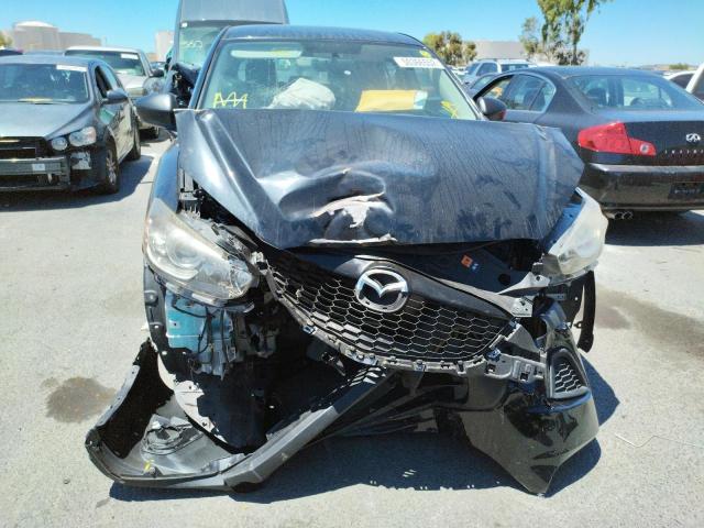 Photo 9 from auction – 2014 MAZDA CX-5 SPORT with VIN JM3KE2BE4E0375967