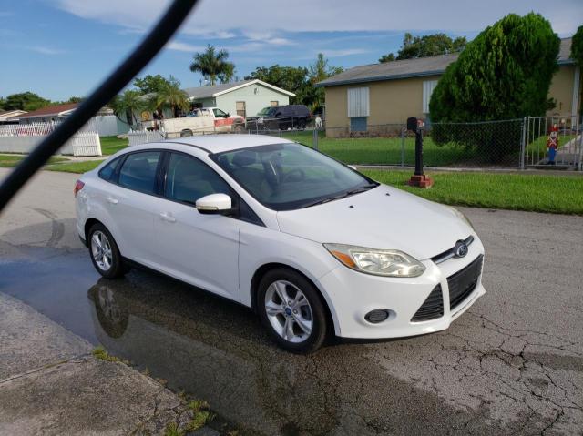 FORD FOCUS SE 2013 with VIN 1FADP3F20DL125792 - Photo from auction
