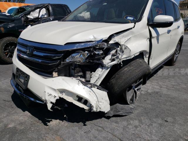Photo 9 from auction – 2018 HONDA PILOT TOUR with VIN 5FNYF5H96JB015509