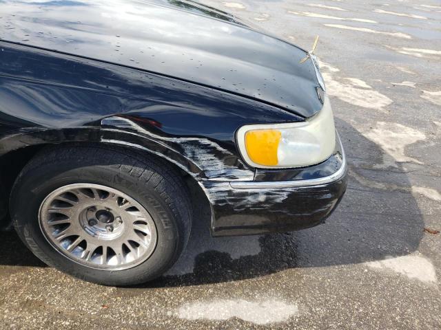 Photo 9 from auction – 2002 LINCOLN TOWN CAR C with VIN 1LNHM83W12Y640272