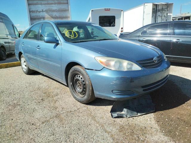 TOYOTA CAMRY LE 2004 with VIN 4T1BE32K64U924575 - Photo from auction