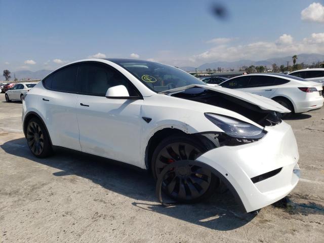TESLA MODEL Y 2022 with VIN 7SAYGDEF0NF446566 - Photo from auction