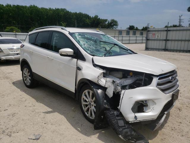 FORD ESCAPE TIT 2017 with VIN 1FMCU0JD9HUE87105 - Photo from auction