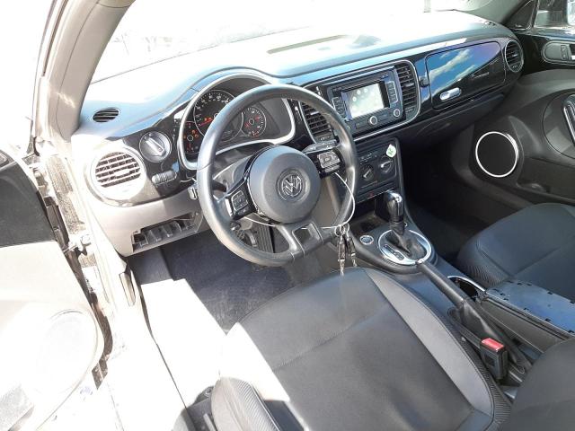 Photo 9 from auction – 2012 VOLKSWAGEN BEETLE with VIN 3VWJP7AT0CM659390