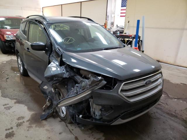FORD ESCAPE SE 2018 with VIN 1FMCU9GD5JUA83512 - Photo from auction