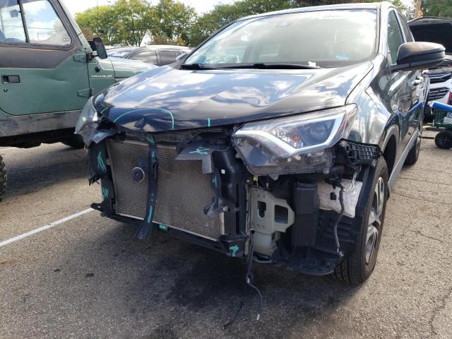 Photo 9 from auction – 2018 TOYOTA RAV4 LE with VIN 2T3BFREV5JW793292