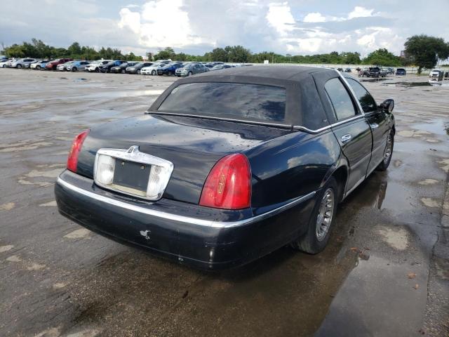 Photo 4 from auction – 2002 LINCOLN TOWN CAR C with VIN 1LNHM83W12Y640272