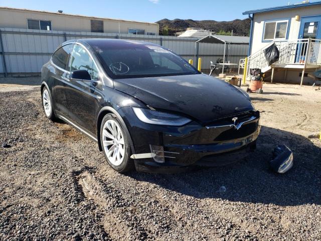 TESLA MODEL X 2020 with VIN 5YJXCAE28LF261212 - Photo from auction