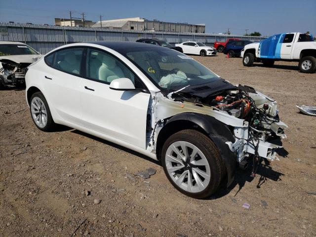 TESLA MODEL 3 2022 with VIN 5YJ3E1EAXNF135243 - Photo from auction