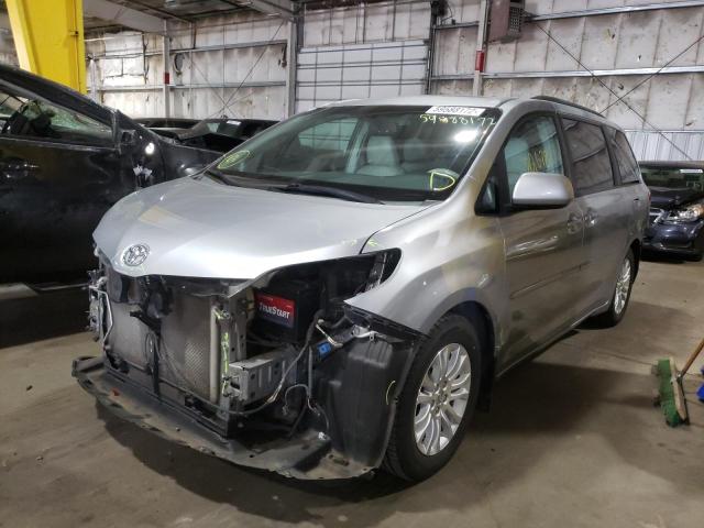 Photo 2 from auction – 2014 TOYOTA SIENNA XLE with VIN 5TDYK3DC5ES460195