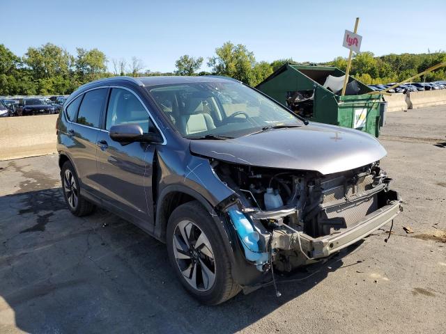HONDA CR-V TOURI 2016 with VIN 5J6RM4H99GL036696 - Photo from auction