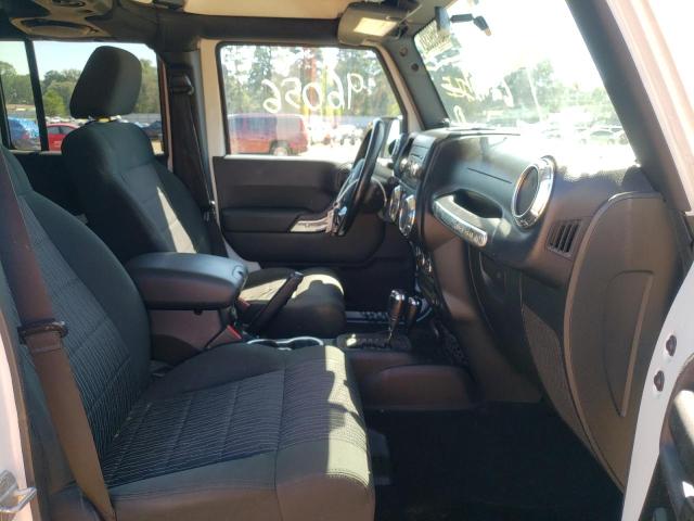 Foto 5 de la subasta – 2011 JEEP WRANGLER U con VIN 1J4BA6H16BL628159