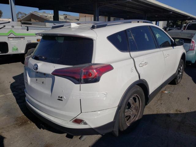 Photo 4 from auction – 2017 TOYOTA RAV4 LE with VIN JTMBFREV5HJ137957