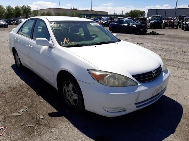 TOYOTA CAMRY LE 2002 with VIN 4T1BF32K22U034990 - Photo from auction