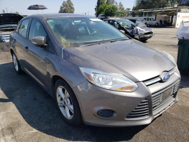 FORD FOCUS SE 2014 with VIN 1FADP3F24EL392158 - Photo from auction