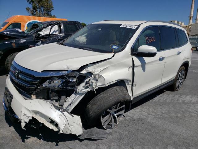 Photo 2 from auction – 2018 HONDA PILOT TOUR with VIN 5FNYF5H96JB015509