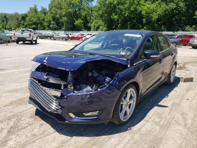 Photo 2 from auction – 2016 FORD FOCUS TITA with VIN 1FADP3J20GL377828