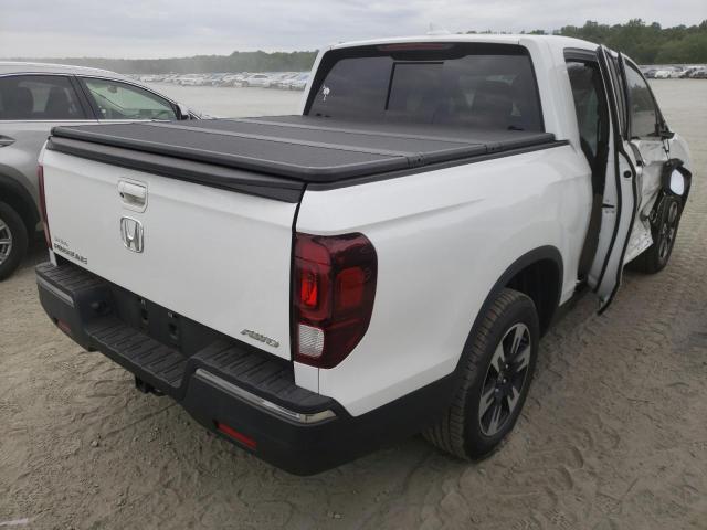 Photo 4 from auction – 2020 HONDA RIDGELINE with VIN 5FPYK3F53LB018314